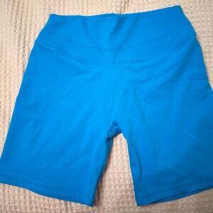 UNIFIEDMOVE HIGH WAISTED SHORTS 6"